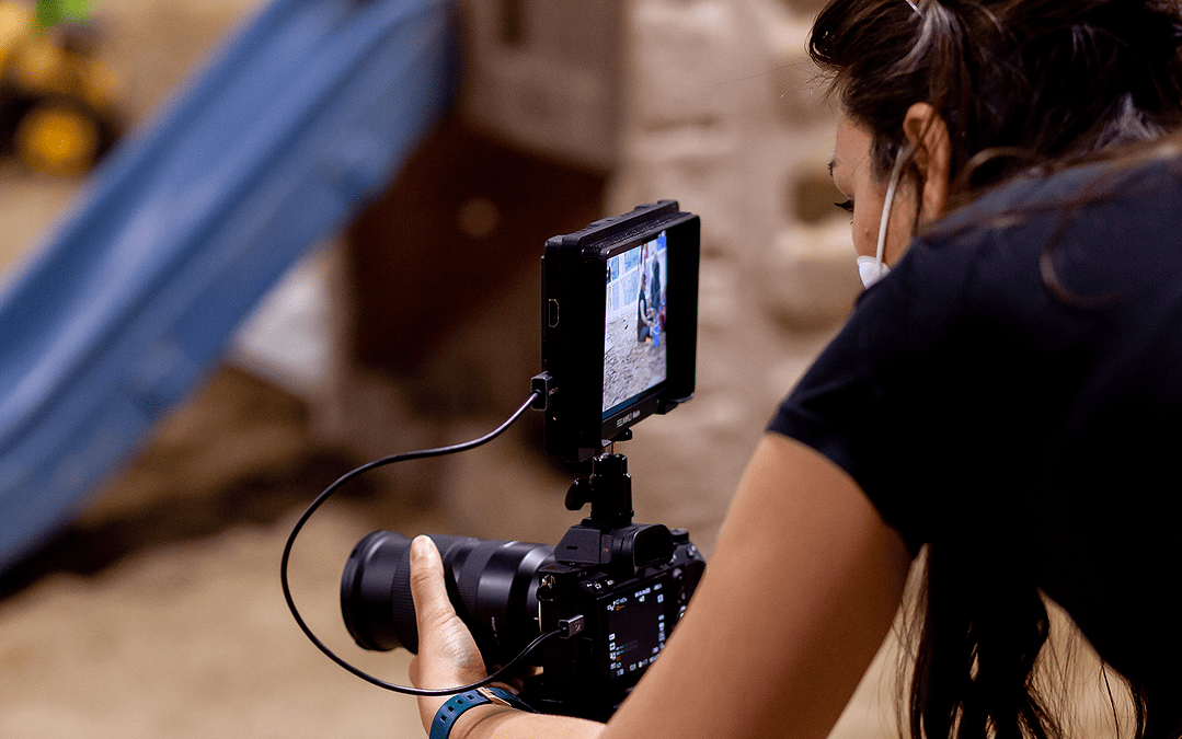 What is B-roll Image Of Woman Operating Camera